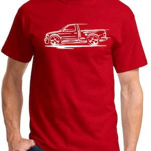 May include: Red t-shirt with a white outline of a Ford F-150 pickup truck.