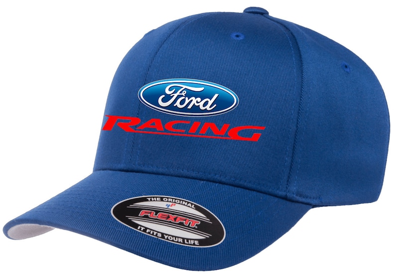 May include: A royal blue baseball cap with a white Ford logo and red "Racing" text. The cap has a Flexfit label on the underside of the brim.