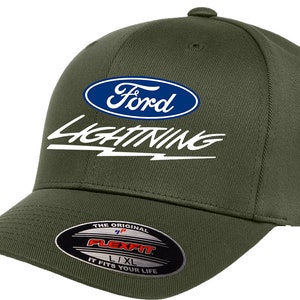 May include: A green baseball cap with a white "Lightning" logo and a blue Ford logo. The cap has a Flexfit label on the back.