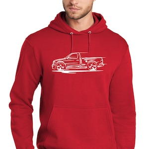 May include: A red hooded sweatshirt with a white outline of a pickup truck on the front.