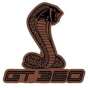 May include: A brown leather-like patch with a black outline of a cobra with the text "GT 350" below it.