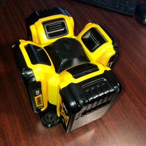 Spinning Dewalt battery holder.  (.stl files only!)