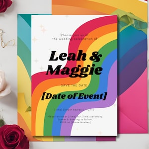 May include: Rainbow-themed save the date card with the text "Please join us at the wedding celebration of Leah & Maggie" and "Save the Date [Date of Event]" with a rainbow background.