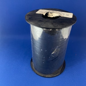Black Crimped poly ribbon 500 yards x 3 1/16 in width.  Great for curling and wrapping balloons, favors, and gifts.