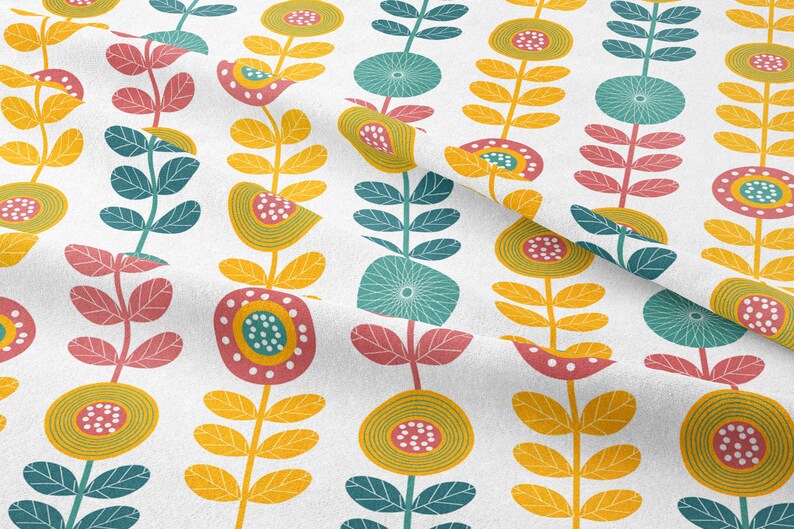 May include: White fabric with a repeating floral pattern. The design features stylized flowers in yellow, teal, and pink, with green leaves and stems. The flowers have circular and teardrop shapes, creating a retro, botanical theme.