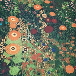May include: A textile print featuring a dense meadow of orange, red, and dark maroon flowers interspersed with small blue blossoms and green foliage. The pattern is set against a dark, textured background, creating a vibrant floral composition.