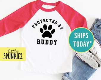 Gift for Dog Lovers, Protected by Custom Dog Name Raglan for Kids, Human Best Friend Shirt (PROTECTED BY DOG)