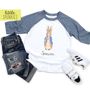 Easter Blue Rabbit Raglan with Name, Personalized Easter Shirt, Easter Bunny Graphic Tee for Kids (BLUE RABBIT)