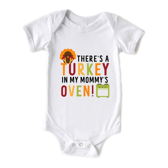 Thanksgiving There Is A Turkey In Mommy's Oven New Sibling T-Shirt Thanksgiving There Is A Turkey In Mommy's Oven New Sibling T-Shirt