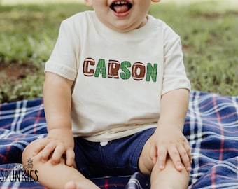Kids Name Football Graphic Tee: Customizable Football & Field Alphabet Letters Shirt - XL25016