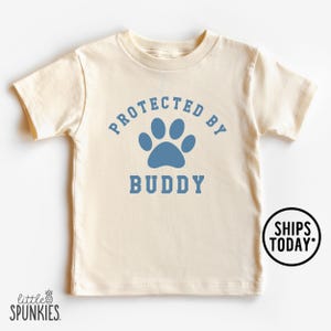 Protected by Dog with Paw T-Shirt: Personalized Pet Name Graphic Tee - NL14550