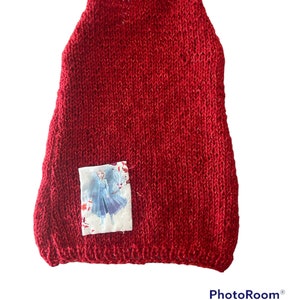Robe tricotée de couleur rouge avec sa poche cousue image 1