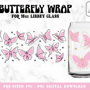 May include: A digital download design for a 16 ounce Libbey glass featuring a butterfly wrap pattern. The design includes pink butterflies with gold outlines and gold stars on a clear glass background. The text "BUTTERFLY WRAP" and "FOR 16oz LIBBEY GLASS" is included in the design.