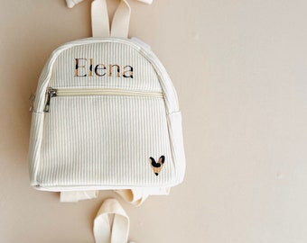 Small corduroy backpack personalized with leopard first name.