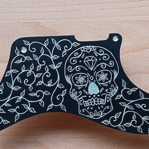 Hand Engraved Cabronita Tele hand made anodised aluminium pickguard in black with Day of the Dead skull and vines motif