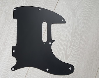 Telecaster black anodised aluminium pickguard. Fits USA and MIM telecasters. Hand made quality item