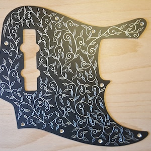 Engraved Jazz Bass Pickguard, hand engraved,  hand made to fit FENDER USA/MIM Jazz Bass
