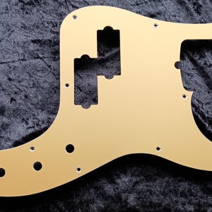 To fit Fender American Deluxe Precision Bass, Aluminium Pickguard  hand made in anodised gold, natural aluminium or anodised silver or black