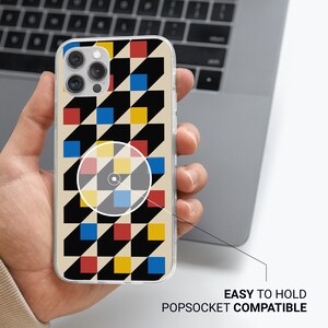 May include: A clear phone case with a geometric pattern of black, red, yellow, and blue squares. The case is compatible with PopSockets.