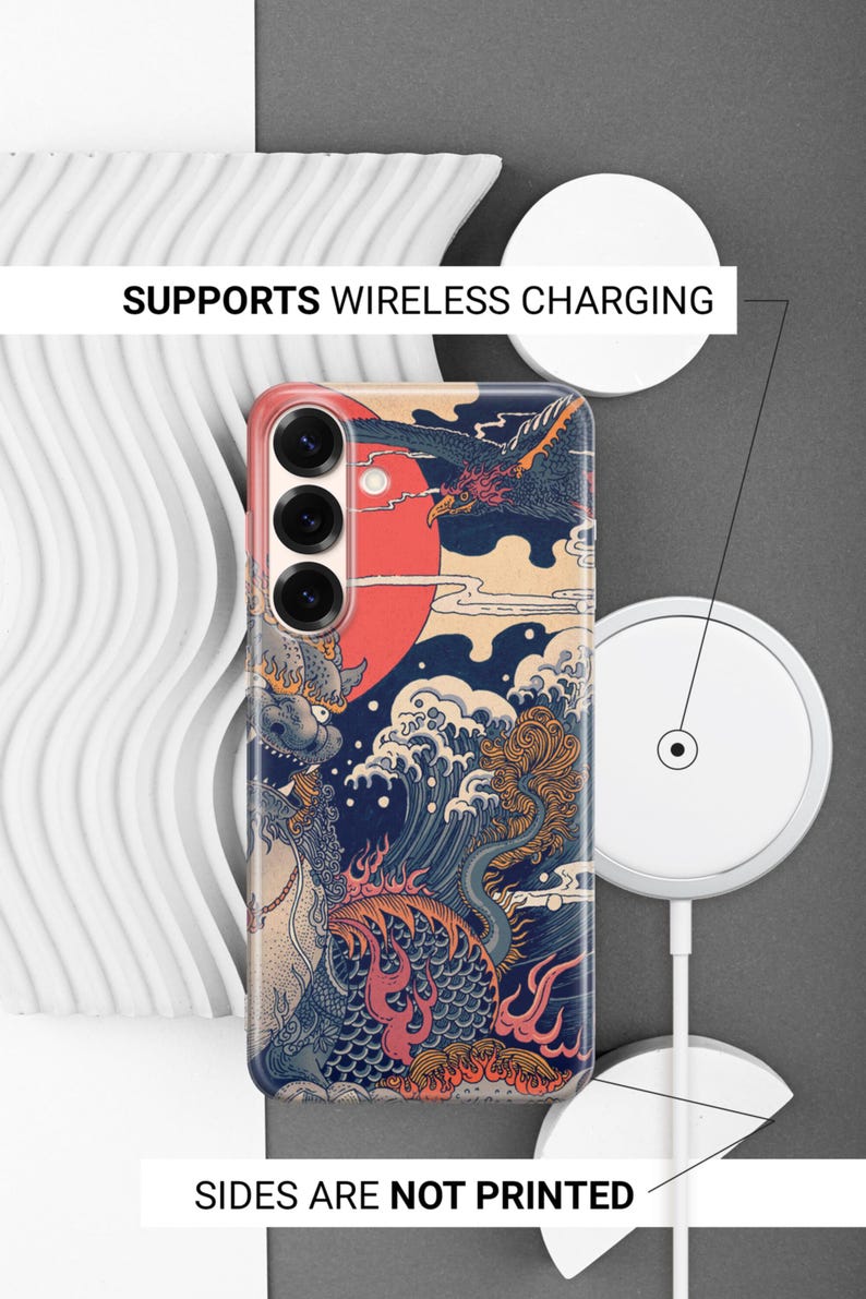 May include: A rectangular smartphone case featuring a graphic print of a dragon, waves, and a large red sun. The case has three circular camera cutouts. Text on the image states: SUPPORTS WIRELESS CHARGING and SIDES ARE NOT PRINTED.