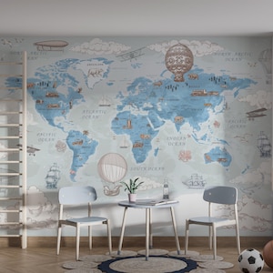 May include: A child's room with a world map mural in blue and tan tones. The room features two light blue chairs, a small table, and a round rug. Decorative elements include hot air balloons, airplanes, and ships.