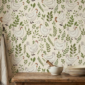 May include: Cream-colored wallpaper with a repeating pattern of white chickens and green foliage. The chickens are outlined in black and have red combs. The foliage includes various leaf shapes and sprigs, creating a whimsical, farmhouse aesthetic.