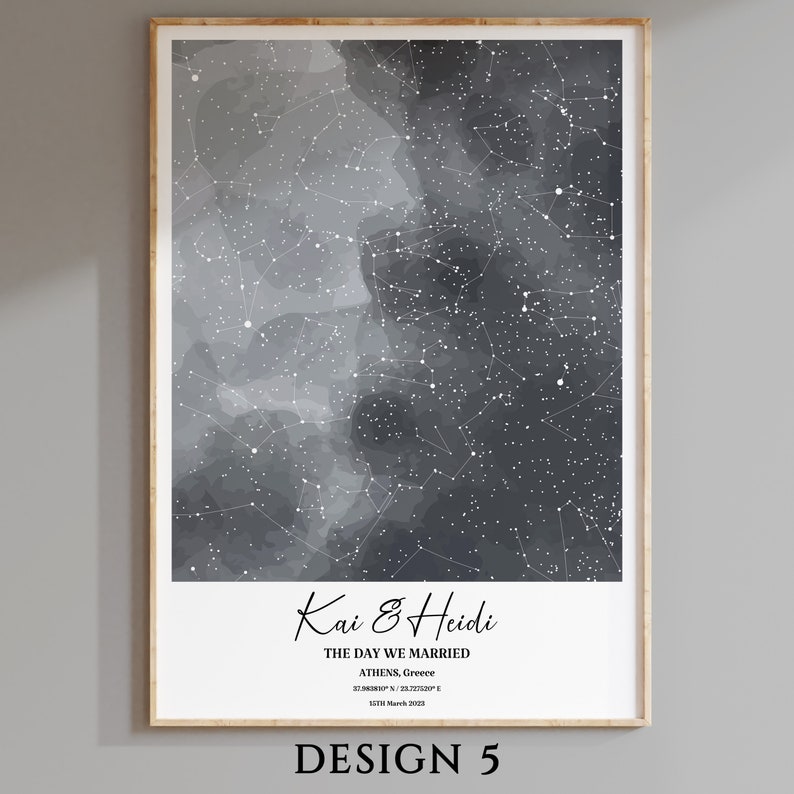 May include: A black and white star map print with a watercolor effect. The print features the names "Kai & Heidi" and the text "The day we married, Athens, Greece, 37.583810&deg; N, 23.721520&deg; E, 15th March 2023".