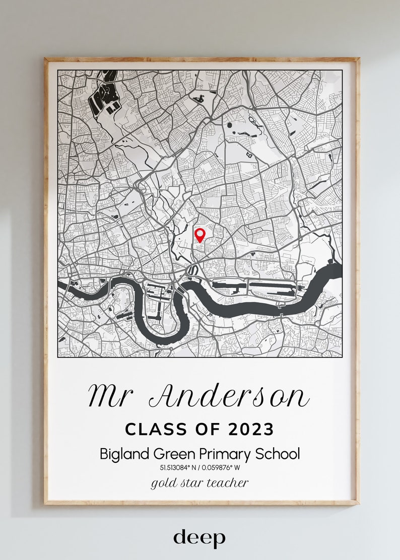 May include: A framed map print featuring a detailed black and white map with a red marker. The print includes the text "Mr Anderson CLASS OF 2023" and "Bigland Green Primary School". The frame is a light wood color.