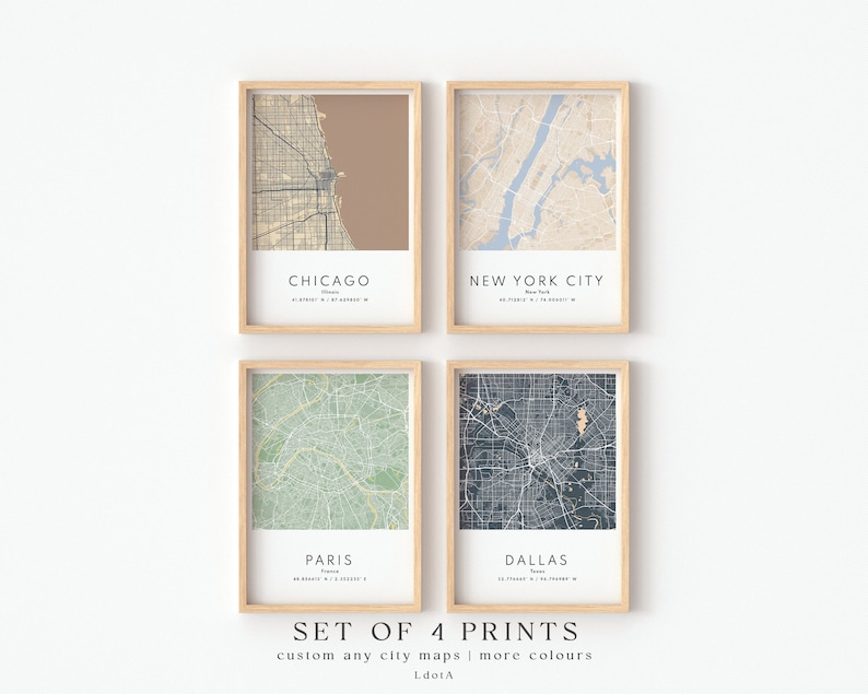 May include: Set of four city map prints in wooden frames. The prints feature maps of Chicago, New York City, Paris, and Dallas. The text "SET OF 4 PRINTS" and "custom any city maps | more colours" is below the prints.