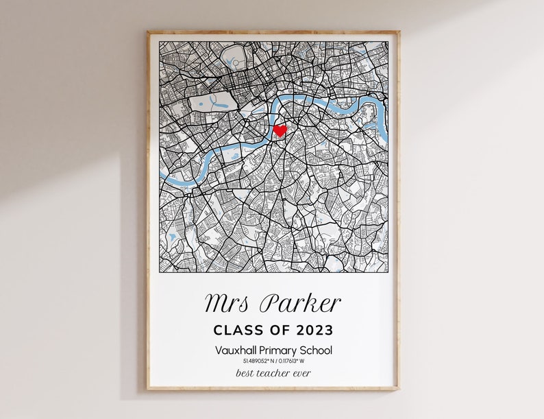 May include: Framed map print of London with a red heart marking a location. The print includes the text "Mrs Parker CLASS OF 2023 Vauxhall Primary School 51.489052 N / 0.17617 W best teacher ever."