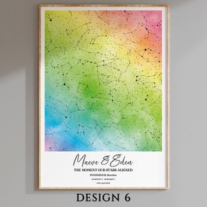 May include: A rainbow watercolor background with a constellation map and the text "Maeve & Eden, The Moment Our Stars Aligned, Stockholm, Sweden, 58.332790N/18.068480E, 16th April 2022, Design 6".