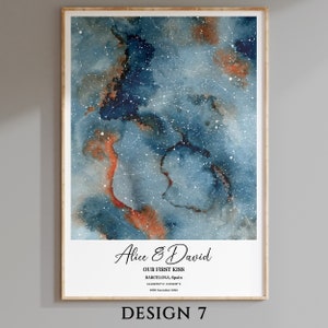 May include: A watercolor print with a blue and orange starry sky background. The print features the names "Alice & David" and the text "Our First Kiss, Barcelona, Spain, 41.404700&deg; N, 2.17512&deg; E, 19th November 2022".