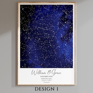 May include: A navy blue watercolor background with white stars and constellations. The text "William & Grace" is written in cursive at the bottom of the image, along with the text "Our First Date", "Barcelona, Spain", "41.404700&deg; N, 2.175122&deg; E", and "24th July 2022".