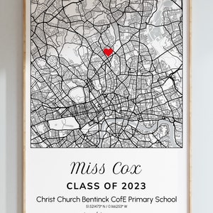 May include: A framed black and white map print with a red heart marking a location. The print includes the text "Miss Cox CLASS OF 2023" and "Christ Church Bentinck CofE Primary School". The bottom of the print reads "teaching queen" and "mono".