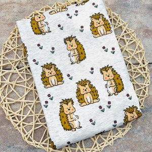 Pile alpino morbidissimo con stampa digitale baby riccio floreale screziato beige melange Maraki