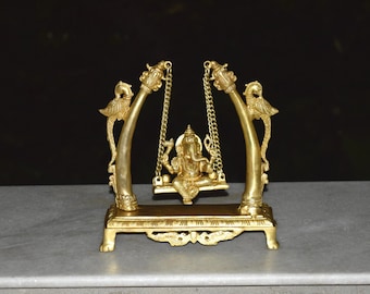Brass Swinging Ganesha With 02 Peacocks and 01 Mouse | Hindu Lord Ganesha Sitting with Pillows