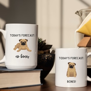 May include: Two white mugs with a pug illustration and the text "TODAY'S FORECAST:" on each. One mug says "no bones" and the other says "BONES!"