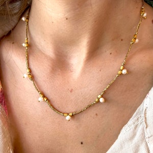 Pearl and golden brass Necklace. Handmade. Original. Perfect for her.