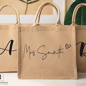 Bridesmaid tote bags personalized with the name of your choice in our beautiful color are great for packaging the bridesmaid and wedding party gifts