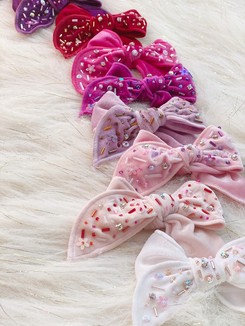 Shiny velvet bowembellished bow