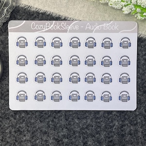 Op de afbeelding: Een vel met 36 stickers met een grijs boek met blauwe koptelefoon. De stickers zijn wit met een afgeronde rand. De tekst "CozyBookSleeve - Audio Book" staat bovenaan het vel.