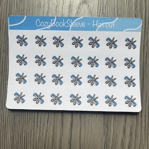 May include: A sheet of stickers with a blue and white border featuring a repeating pattern of scissors and comb icons. The text "CozyBookSleeve - Haircut" is printed at the top.