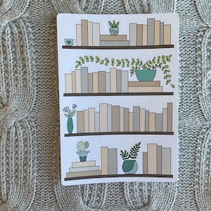 May include: Four sets of printable stickers featuring illustrations of bookshelves with books, plants, and other decorative elements. The stickers are designed for use in planners, journals, and other paper crafts.
