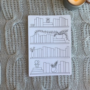 May include: A printable sheet with a black and white illustration of a bookshelf with four shelves. Each shelf has books and plants.