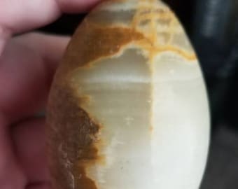 Green onyx egg smooth polished with stand.