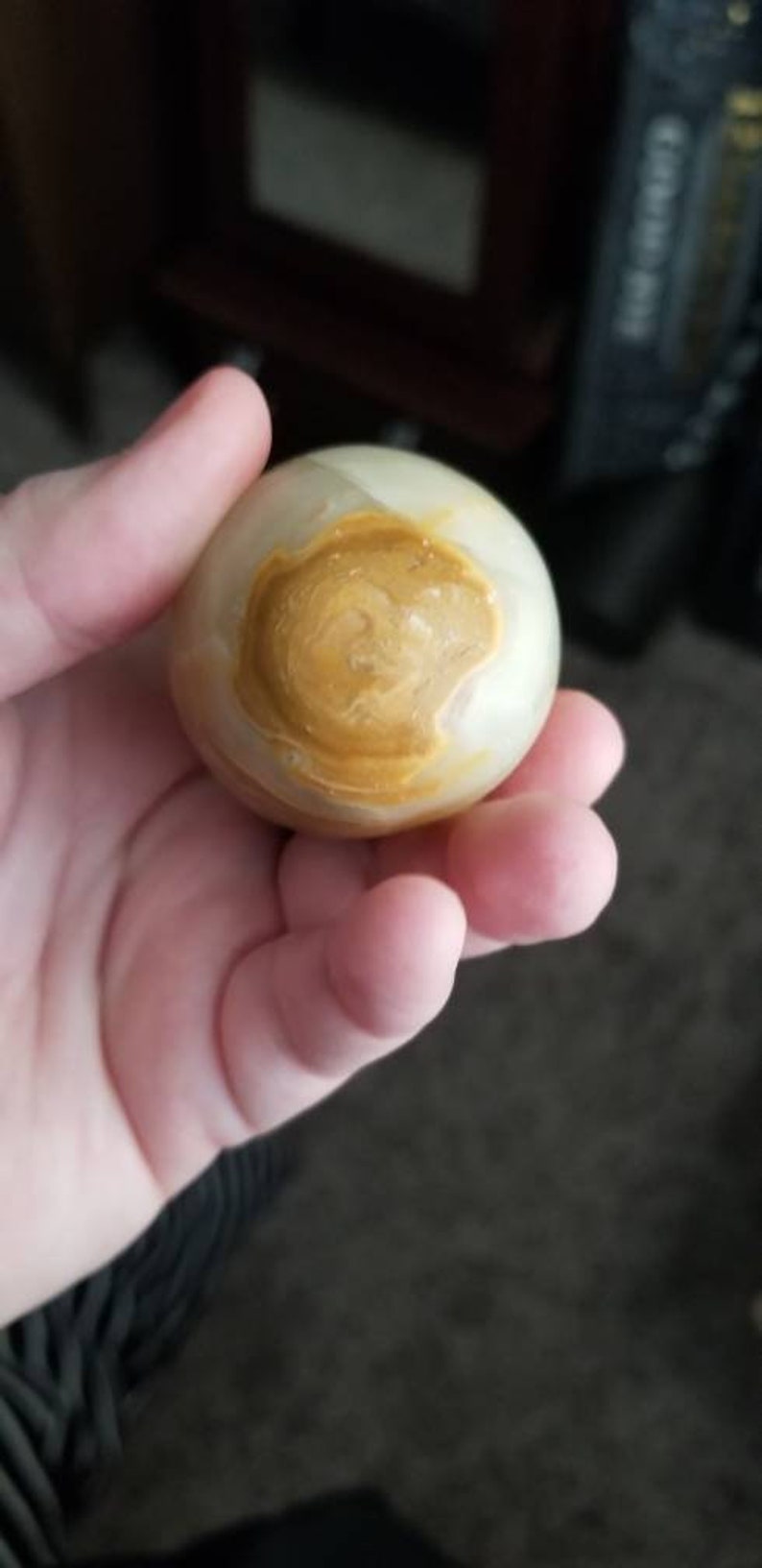 Green onyx egg smooth polished with stand.