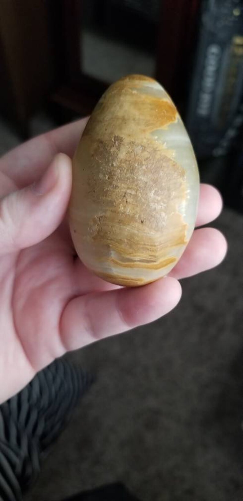 Green onyx egg smooth polished with stand.