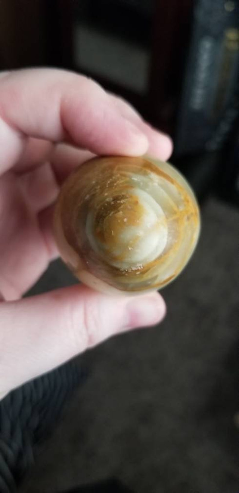 Green onyx egg smooth polished with stand.