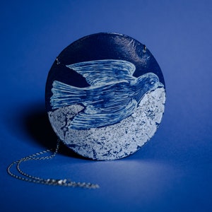 Blue Bird symbol of freedom and good news. Cyanotyped necklace.