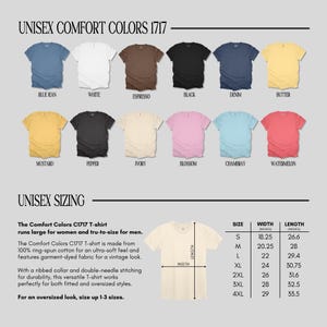 Op de afbeelding: Een display van Comfort Colors C1717 unisex t-shirts in diverse kleuren, waaronder blauwe spijkerbroek, wit en zwart. De maattabel toont de afmetingen in inches, omgerekend in cm voor breedte en lengte.